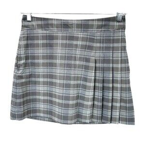 Nike neutral hues  Plaid Golf Skort. Dri fit fabric with pockets. Size 8
